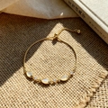 Gouden opaal vis armband met verstelbare ketting en fonkelende zirkonia stenen - Fish Cat's Eye / Goud
