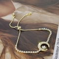 Elegant gold-tone moon and star pendant bracelet with sparkling zircon stones and adjustable chain - Full Diamond Star & Moon Bracelet-Gold