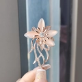Vintage orchid flower brooch with cat eye stones and sparkling crystals in rose gold - Pinkish White