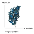 Broche de hoja de cristal azul con acabado plateado mide 7,1cm por 4,2cm - Azul
