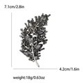 Silver-finish feather brooch with grey crystals measuring 7.1cm x 4.2cm for women - Black
