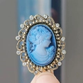 Vintage Victorian style cameo brooch featuring a white silhouette on blue background - Cameo Lady Brooch / Blue