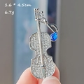 Elegant silver violin brooch with sparkling white rhinestones and blue teardrop gem pendant - Silver Violin Blue Rhinestone Style (XZ0265-27)