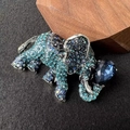 Detail of elephant brooch with deep blue pear-cut gemstone and pavé rhinestones - Blue