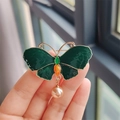 Green enamel butterfly brooch in golden alloy finish with elegant pearl pendant charm - Dark Green Style (XZ0344-3)