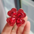 Elegant gold-tone four-leaf clover brooch featuring vibrant red rhinestones for women - Red Large (XZ0190)