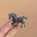 Exquisite galloping horse brooch with dark green crystals and gun black metal finish - Enamel Steed Brooch Black