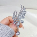 Elegant angel wing brooch with clear zircons, grey pearl and pear-cut crystal pendant - Silver Wing Brooch