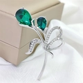 Eleganter Tulpen-Brosche mit smaragdgrünen Kristallen und silberner Schleife mit Zirkonen - Silber