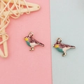 Detailed view of colorful bird enamel pendants for DIY jewelry making in gold metal - Purple and Cyan Patchwork Style (1) / Purple and Cyan Patchwork