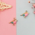 Detailed close-up of golden metal bird charms with colorful enamel for jewelry making - Pink Cyan and Brown Patchwork Style (2) / Pink Cyan and Brown Patchwork