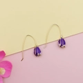 Detail of purple tulip pendant earrings with golden long hooks and enamel finish - Purple