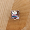 Detailed macro view of an alloy owl pendant with colorful glitter enamel for DIY jewelry - Owl Style 2