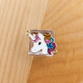 Detail of unicorn pendant with colorful enamel and gold finish on wooden background - Unicorn Style 1