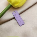 Close-up of a purple alloy ruler pendant with clear scales for jewelry DIY crafts - Light Purple