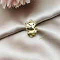 Detailed macro view of a golden ox pendant with Fu character on luxury satin fabric - K Gold Red Fortune Ox