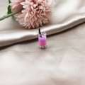 Macro detail of resin pink bubble tea charm with black pearls on silk background - Style 4 (4)