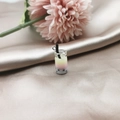 Macro shot of miniature 3-layer bubble tea charm with black pearls on silk fabric - Style 5 (5)