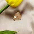 Mini beige motorcycle helmet pendant in gold metal finish with Safety text - Pink Helmet