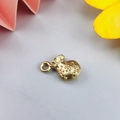 Close-up of golden lucky bag pendant accessory with intricate grainy texture details - Matte Gold Fortune Bag