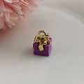 Detailed view of a purple 3D gift box charm with golden bow for DIY jewelry making - Purple