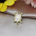 Detail of pink enamel Ace of Spades charm with gold plating and zircon crystals - Pink