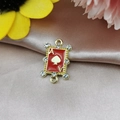 Macro detail of red enamel Ace of Spades poker charm with crystals and gold finish - Red
