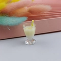 Macro shot of miniature milkshake cup pendant with yellow filling and striped straw detail - Pale Yellow Style (7)