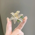 Exquisite lily flower brooch with sparkling rhinestones and green enamel details - Lily Shape