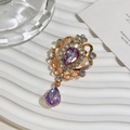 Vintage gold-plated crystal brooch with teardrop purple stones and sparkling rhinestones - Light Purple