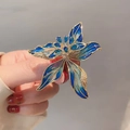 Macro shot of blue flower brooch with gold plating and sparkling crystal detailing - Blue Rose Flower (XZ1512) / Blue