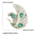 Dettaglio dimensioni spilla a pavone 8,2cm x 6,8cm in filigrana dorata vintage - Verde