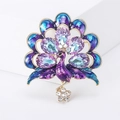 Golden peacock brooch with purple crystals and blue enamel feathers in a luxury style - Peacock Brooch / Purple Rhinestone