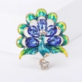 Elegant peacock brooch featuring blue water-drop gems and green enamel in gold finish - Blue Rhinestone