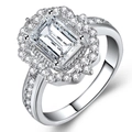 Rose gold plated ring featuring emerald cut cubic zirconia with halo pavé setting - US 10 / White