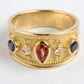 Bague vintage française dorée avec pierre orange en goutte et accents de bleu - Taille 6 / Style Gemme Orange Goutte (CY1328)