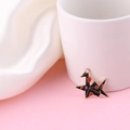 Detail showing a black origami crane charm with red cherry blossom pattern and gold edge - Left Side Style / Black Paper Crane Style (YZ008)