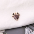Detailed close-up of a Christmas reindeer alloy charm with enamel finish and small rhinestone - Red Nose Reindeer Style (3)
