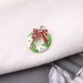 Macro shot of alloy Christmas wreath pendant with enamel details and sparkling rhinestone - Christmas Wreath Style (4)