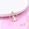 Golden bunny charm with white enamel and pearl accent for DIY jewelry making - White