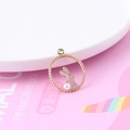 Cute bunny DIY pendant with lavender enamel and white pearl in a golden metal ring - Pink