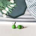 Macro view of miniature matcha green bubble tea pendants for DIY jewelry and accessories - Matcha Green