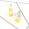 Miniature yellow wine bottle charms with silver hanging rings and realistic labels - Yellow