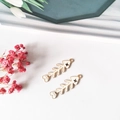 Detail of fish bone charms with white enamel and gold plating for jewelry making - White