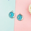Detailed view of blue celestial moon and star alloy charms for DIY jewelry making - Blue Starry Sky (Silver Metal)