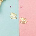 Detail of cream enamel rocking horse pendants with gold plating for DIY jewelry - White