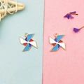 Detailed view of colorful enamel windmill pendants with gold metal frames for DIY jewelry - Four-Color Windmill (Style 1)