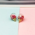 Set of two transparent glass ball pendants filled with red star sequins and gold caps - Burgundy