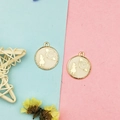 Golden alloy charm with clock girl enamel design on pastel blue and pink background - Pink