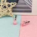 Macro detail of mini resin drink charms with pink daisy flowers and silver metal rings - Pink Daisy Style (2)